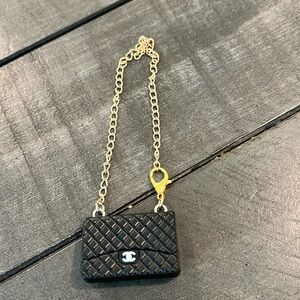 Labubu accessories: black handbag. No doll